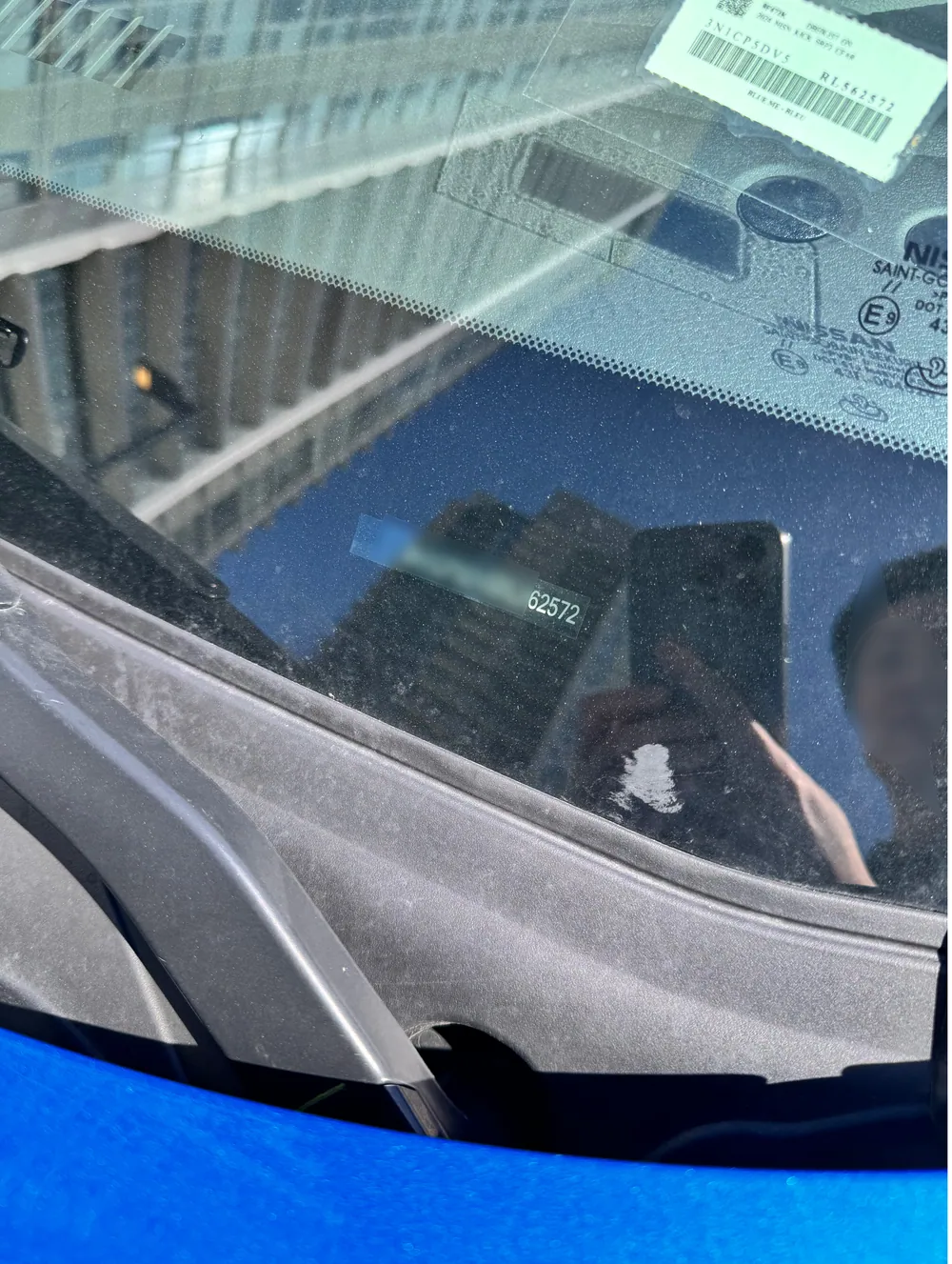 Close-range evidence capture of the vehicle identification number.